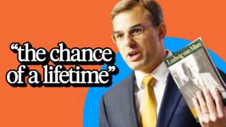 Justin Amash holding up Mises book. | Lex Villena