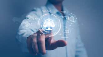 Man touching a screen symbolizing AI | Suriya Phosri | Dreamstime.com