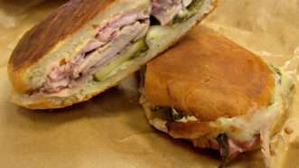 A Cuban sandwich cut in half | Photo: Robert/Creative Commons