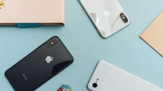 Apple iPhones on a table | Photo by <a href="https://unsplash.com/@arnelhasanovic?utm_content=creditCopyText&utm_medium=referral&utm_source=unsplash">Arnel Hasanovic</a> on <a href="https://unsplash.com/photos/space-gray-iphone-x-on-blue-surface-4oWSXdeAS2g?utm_content=creditCopyText&utm_medium=referral&utm_source=unsplash">Unsplash</a>   